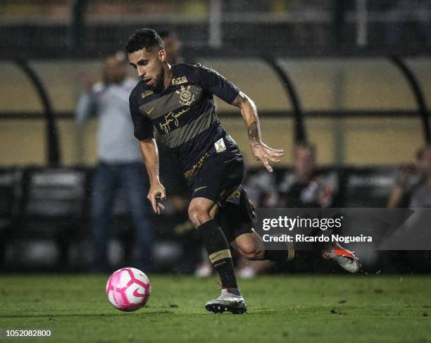 Gabriel of Corinthians drives the ball during the match between Santos and Corinthians as a part of Campeonato Brasileiro 2018 at Pacaembu Stadium on...