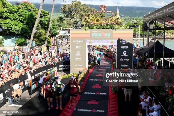 Alexandre Vinokourov crosses the finish line during the IRONMAN World Championships brought to you by Amazon on October 13, 2018 in Kailua Kona,...