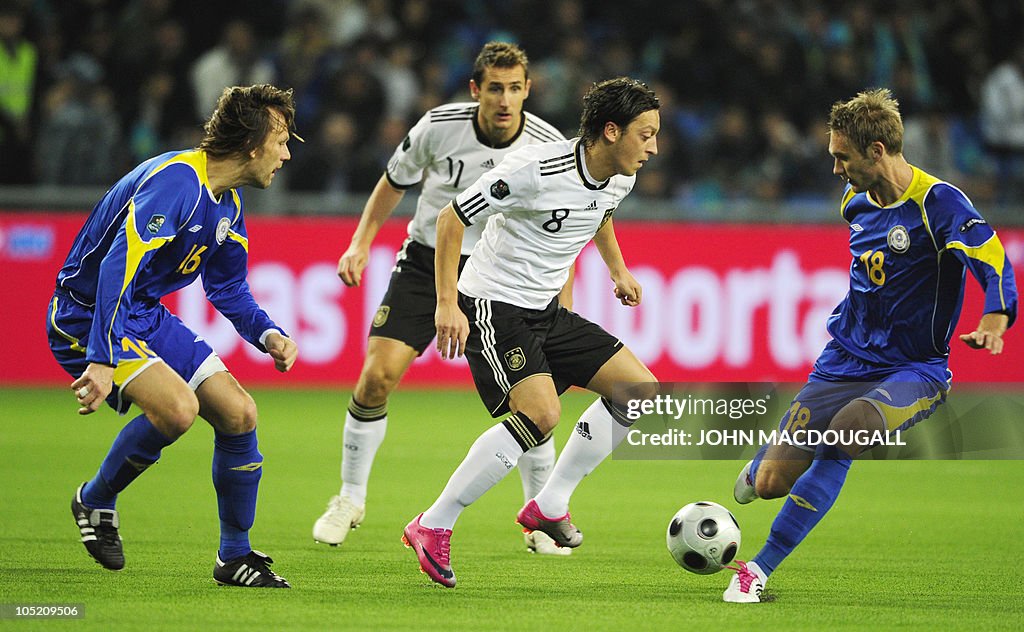 Germany's midfielder Mesut Oezil (2nd fr