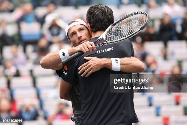 Lukasz Kubot of Poland and Marcelo Melo of Brazil celebrates after winning the Men's doubles final match against Jamie Murray of Great Britain and...