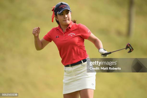 Yui Kawamoto of Japan reacts after her putt on the 18th green during the final round of the Udonken Ladies at Mannou Hills Country Club on October...