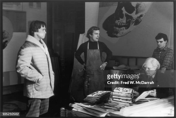American pop artist Andy Warhol meets with Austrian-born American bodybuilder Arnold Schwarzenegger at Warhol's Studio, the Factory, New York, New...