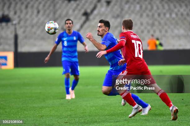 Lazaros Christodoulopoulos of Greece, tries to avoid Istvan Kovacs of Hungary during UEFA Nations League Greece vs Hungary. Greece won 1-0.