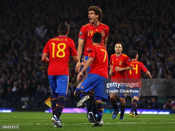 Fernando Llorente of Spain celebrates his goal during the UEFA EURO 2012 Group I qualifying match between Scotland and Spain at Hampden Park on...