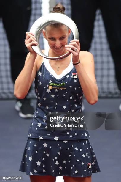 Runner-up Karolina Pliskova of Czech Republic poses with trophy during victory ceremony after the singles final match against Caroline Garcia of...