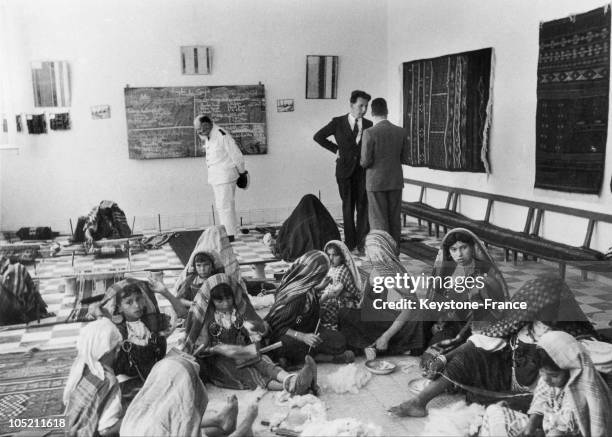 Admiral Jean-Pierre Esteva, Resident General Of France In Tunisia And First-Hand Man Of Field Marshall Petain, Examining The Students' Woolwork In A...