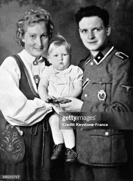 German Parents With A German Allegedly Aryan Girl Born In A Lebensborn : Center Of Eugenics During The Second World War. The Father Wears A Uniform...