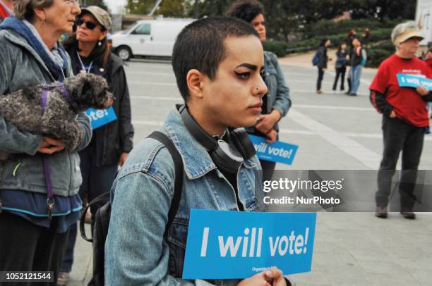 Puerto Rican Philadelphians and their supporters march to Remember Puerto Rican Victims of Colonialism in Philadelphia, PA, on 13 October 2018. They...