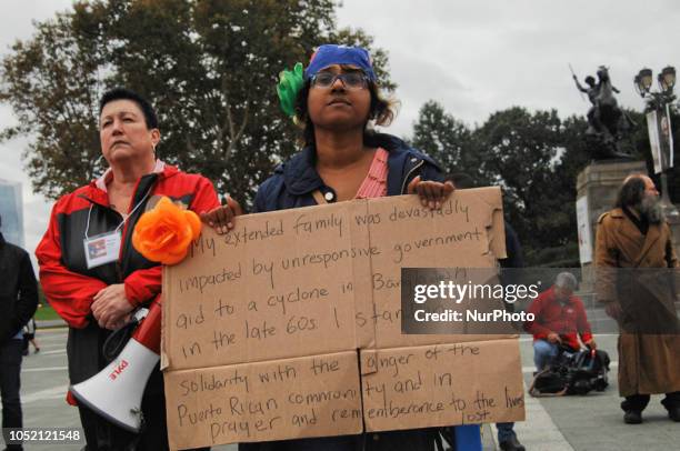 Puerto Rican Philadelphians and their supporters march to Remember Puerto Rican Victims of Colonialism in Philadelphia, PA, on 13 October 2018. They...