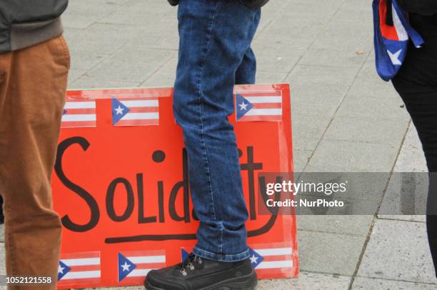 Puerto Rican Philadelphians and their supporters march to Remember Puerto Rican Victims of Colonialism in Philadelphia, PA, on 13 October 2018. They...