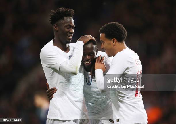 Bruma of Portugal celebrates with Eder and Helder Costa after he scores his team's third goal during the International Friendly match between...