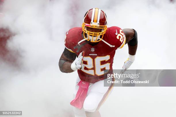 Running Back Adrian Peterson of the Washington Redskins takes the field prior to the game against the Carolina Panthers at FedExField on October 14,...