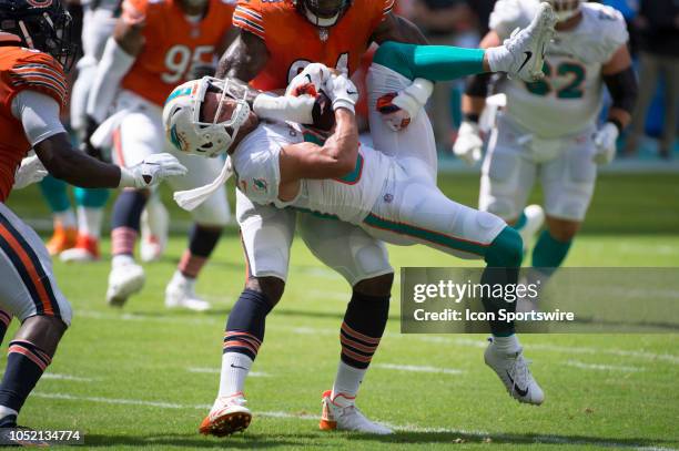 Chicago Bears Linebacker Leonard Floyd picks up Miami Dolphins Wide Receiver Danny Amendola flipping him upside down resulting in a personal foul...