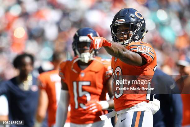 Tarik Cohen of the Chicago Bears celebrates a touchdown with teammates in the third quarter against the Miami Dolphins at Hard Rock Stadium on...