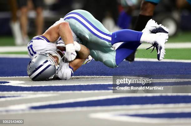 Cole Beasley of the Dallas Cowboys hits the ground after diving for a second quarter touchdown against the Jacksonville Jaguars at AT&T Stadium on...