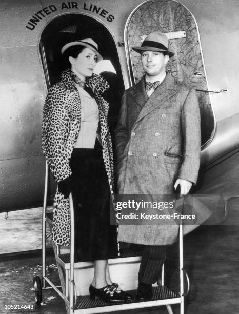The Baron Philip H. Rothschild with The Italian Designer Elsa Schiaparelli, Boarding A Place At Newark Airport For San Francisco On July 5, 1935.