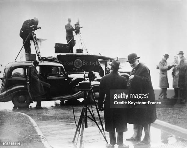Louis Lumiere In The Foreground On The Right, Beting Filmed By A News Crew Upon His Arrival In Croydon On February 18, 1936.