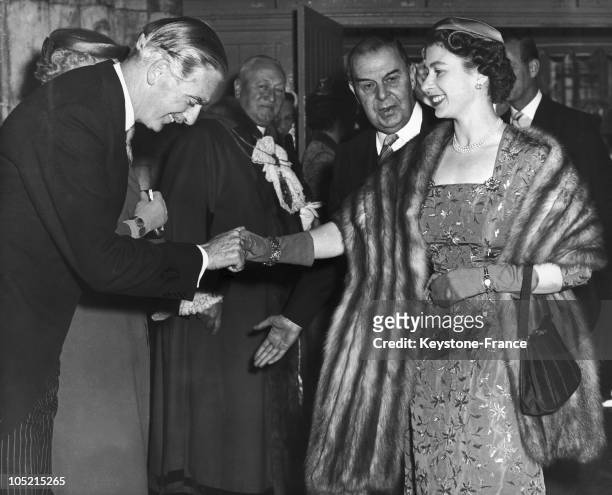 Queen Elizabeth Ii Shaking Hands With The Conservative British Prime Minister, Sir Anthony Eden, At The Banquet Hall In London Town In May 1956.