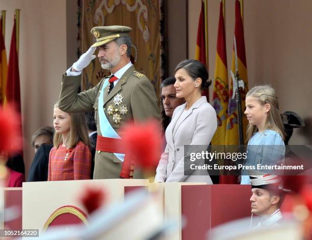 Princess Leonor, King Felipe of Spain, Queen Letizia of Spain and Princess Sofia attend the National Day Military Parade on October 12, 2018 in...