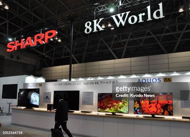 Photo shows Sharp Corp.'s 8K ultra-high-definition TVs displayed at its booth during a press preview of the Combined Exhibition of Advanced...