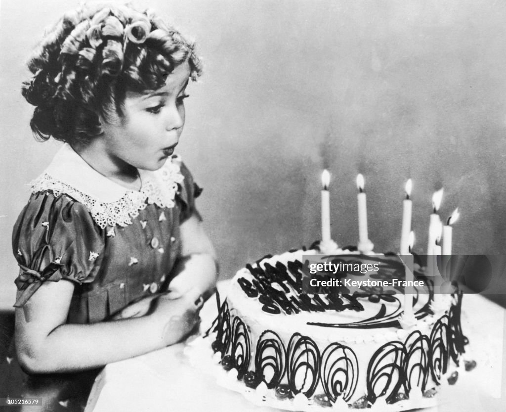 Shirley Temple And Her Birthday Cake In 1935