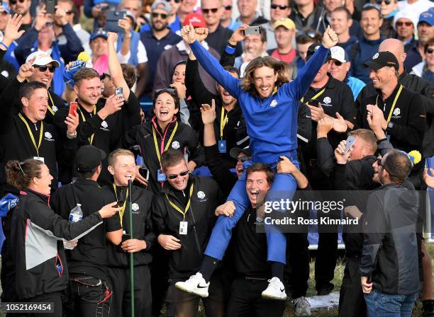 Tommy Fleetwood of Europe celebrates after winning The Ryder Cup during singles matches of the 2018 Ryder Cup at Le Golf National on September 30,...