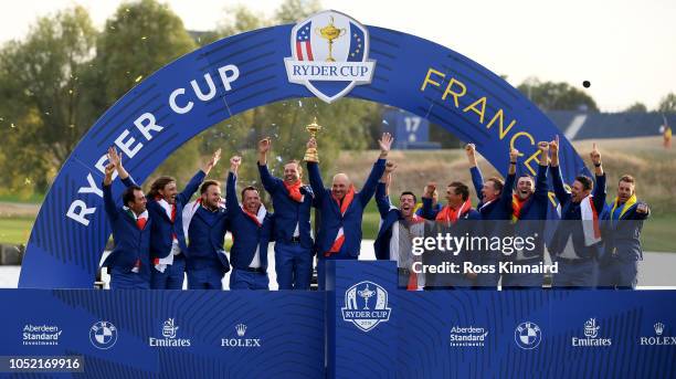 Team Europe celebrates after winning The Ryder Cup after the singles matches of the 2018 Ryder Cup at Le Golf National on September 30, 2018 in...