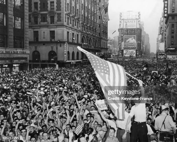 On May 8 Large Crowds Invaded The Streets Of New York At The Corner Of 105Th And 106Th Street To Celebrate Japan'S Surrender And The End Of The War...