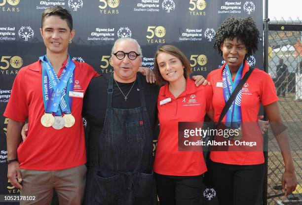 Special Olmpics athletes Brett Laza, Kyla Schilz and Krystal Johnson pose with Chef Tanino Drago at the Special Olympics Pier Del Sol held at Pacific...