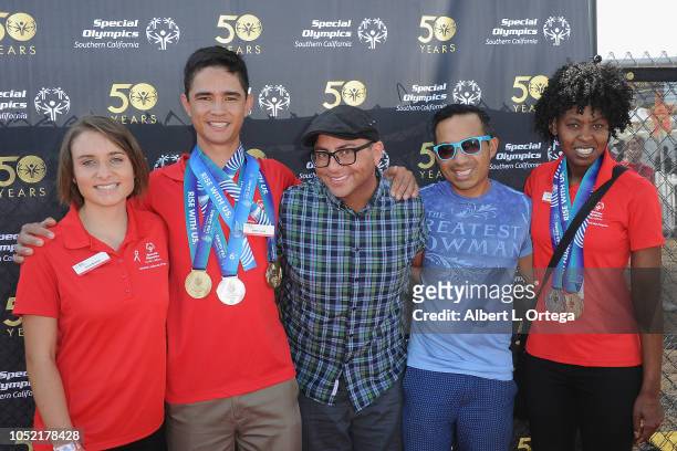 Special Olympics athletes Brett Laza, Kyla Schilz and Krystal Johnson pose with Pauly & Morks of "Gay Uncles" at the Special Olympics Pier Del Sol...