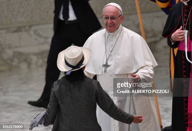 Pope Francis greets Angela Morales, the personal assistant of slain Salvadoran archbishop Oscar Romero, during an audience with pilgrims from El...