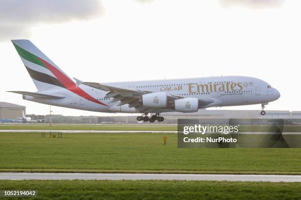 An Emirates airplane, the double-decker Airbus A380 with registration A6-EOO is approaching Amsterdam Schiphol International Airport arriving at...