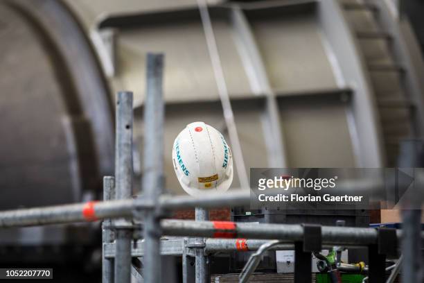 Helmet with the letterig Siemens is pictured at the steam turbine factory on October 15, 2018 in Goerlitz, Germany.