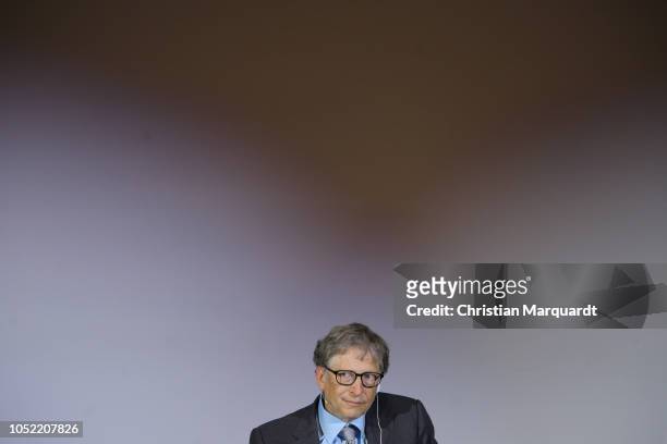 Bill Gates seated onstage at Innovation potential in Africa Event at Technical University of Berlin on October 15, 2018 in Berlin, Germany. Under the...