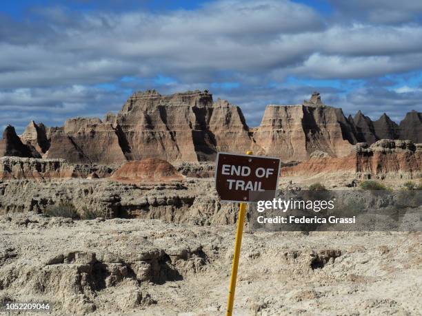 end of trail sign at badlands national park, south dakota - trail marker stock pictures, royalty-free photos & images