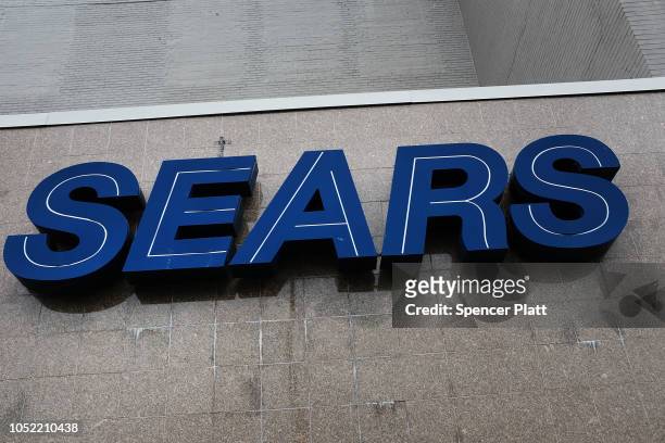 Sears sign is displayed at a store on October 15, 2018 in the Brooklyn borough of New York City. The iconic American retailer has filed for Chapter...