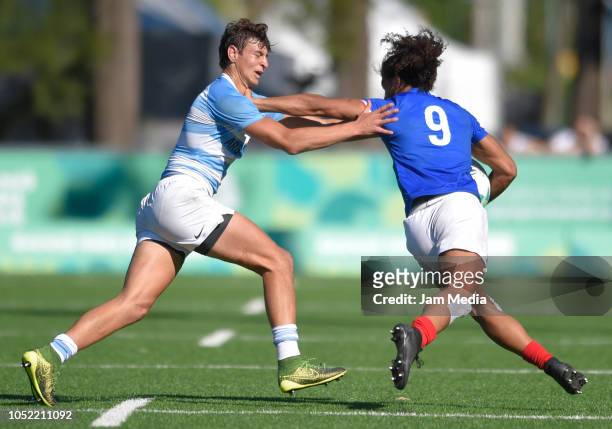 Juan Gonzalez of Argentina tackles Erwan Dridi of France during a match between Argentina and France on day 9 of Buenos Aires 2018 youth Olympic...