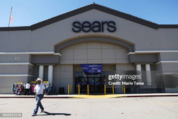 Man walks out of a Sears store on October 15, 2018 in Montebello, California. The iconic American retailer has filed for Chapter 11 protection from...