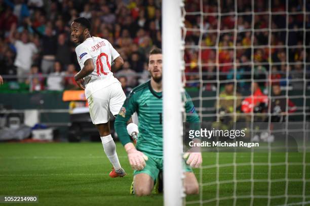 Raheem Sterling celebrates his second goal as David de Gea looks on during the UEFA Nations League A group four match between Spain and England at...