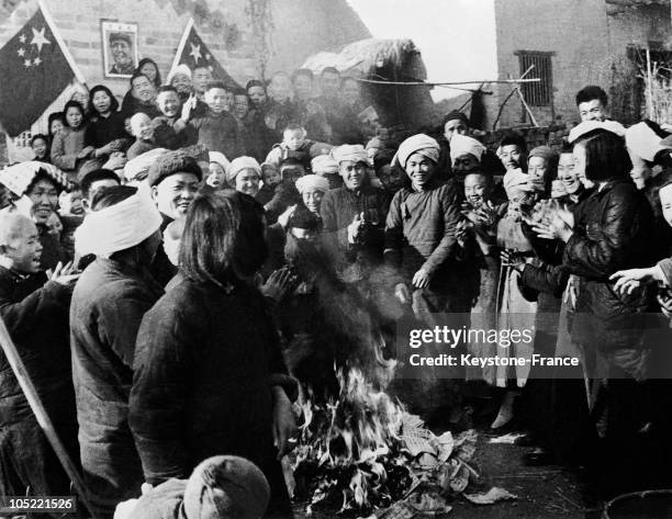 On 1950, In The Scope Of The Agrarian Reforms Undertaken By Mao Tse Tung'S Communist Government In China, Chinese Peasants Burn Old Property...