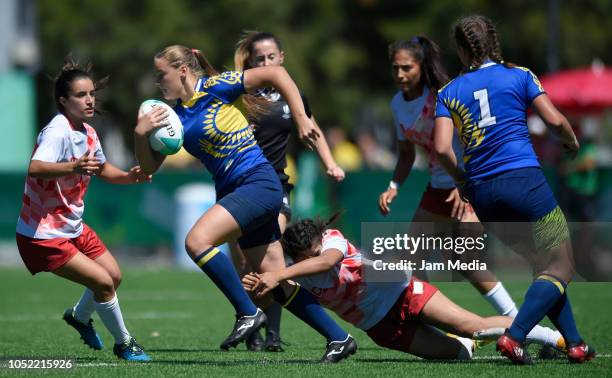 Vlada Odnoletok of Kazakhstan charges upfield during a match between Kazakhstan and Tunisia on day 9 of Buenos Aires 2018 youth Olympic Games at Club...