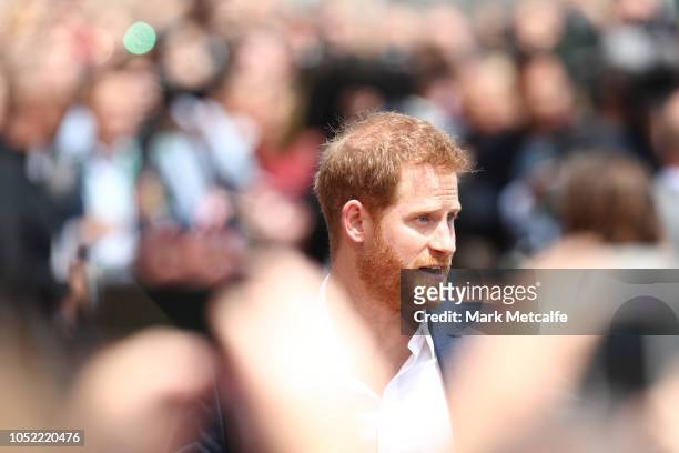 Prince Harry, Duke of Sussex meets with the public during a walkabout near the Sydney Opera House on October 16, 2018 in Sydney, Australia. The Duke...