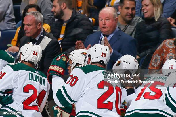 Head coach Bruce Boudreau of the Minnesota Wild coaches during the third period of a 4-2 Predators victory at Bridgestone Arena on October 15, 2018...