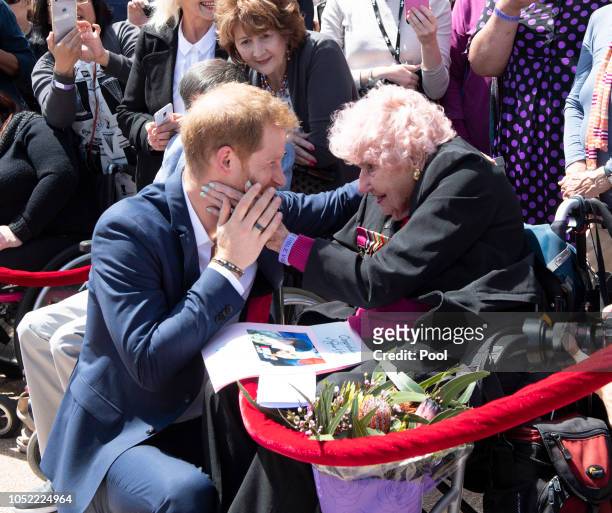 Prince Harry, Duke of Sussex meets 98 year old Daphne Dunne during a meet and greet at the Sydney Opera House on October 16, 2018 in Sydney,...