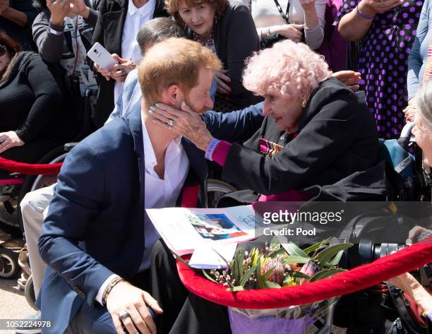 Prince Harry, Duke of Sussex meets 98 year old Daphne Dunne during a meet and greet at the Sydney Opera House on October 16, 2018 in Sydney,...