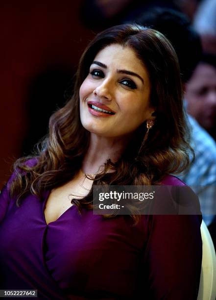 Indian Bollywood actress Raveena Tandon attends the poster launch of upcoming Hindi Film Radha Kyu Gori Main Kyu Kaala in Mumbai on October 15, 2018.