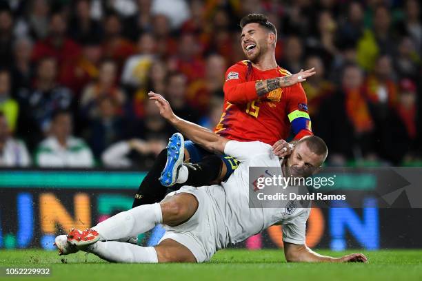 Sergio Ramos of Spain is challenged by Eric Dier of England during the UEFA Nations League A group four match between Spain and England at Estadio...