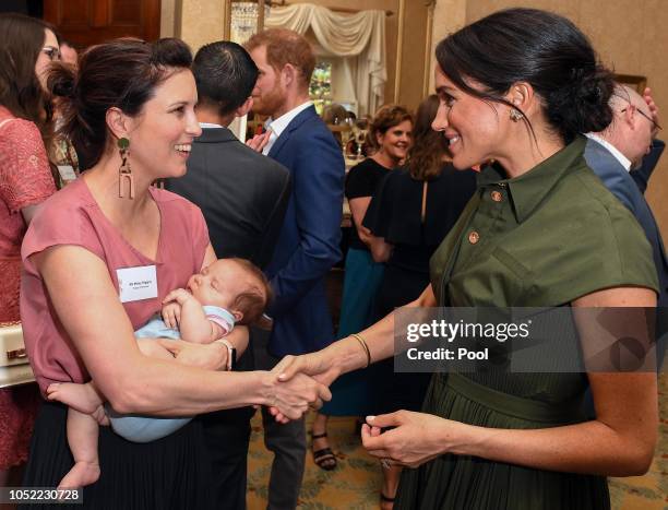 Meghan, Duchess of Sussex talks to Australian Singer Missy Higgins, with her 9 week old baby Lunar, at an afternoon reception hosted by the...