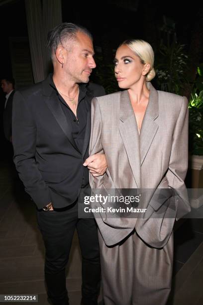 Christian Carino and Lady Gaga attend ELLE's 25th Annual Women In Hollywood Celebration presented by L'Oreal Paris, Hearts On Fire and CALVIN KLEIN...