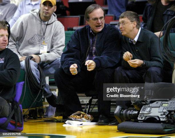 Paul Allen, owner of the Portland Trail Blazers and co-founder of Microsoft Corp., left, sits with Bill Gates, chairman and co-founder of Microsoft...